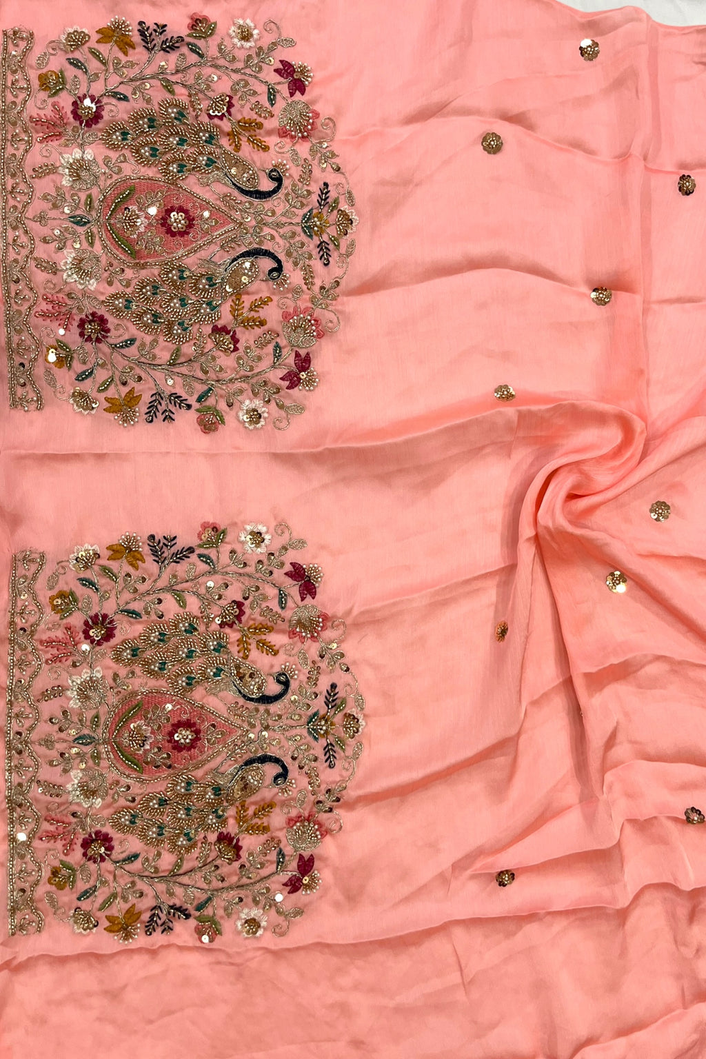 Coral Peach Printed Floral Organza Saree with Embroidered Peacock Blouse
