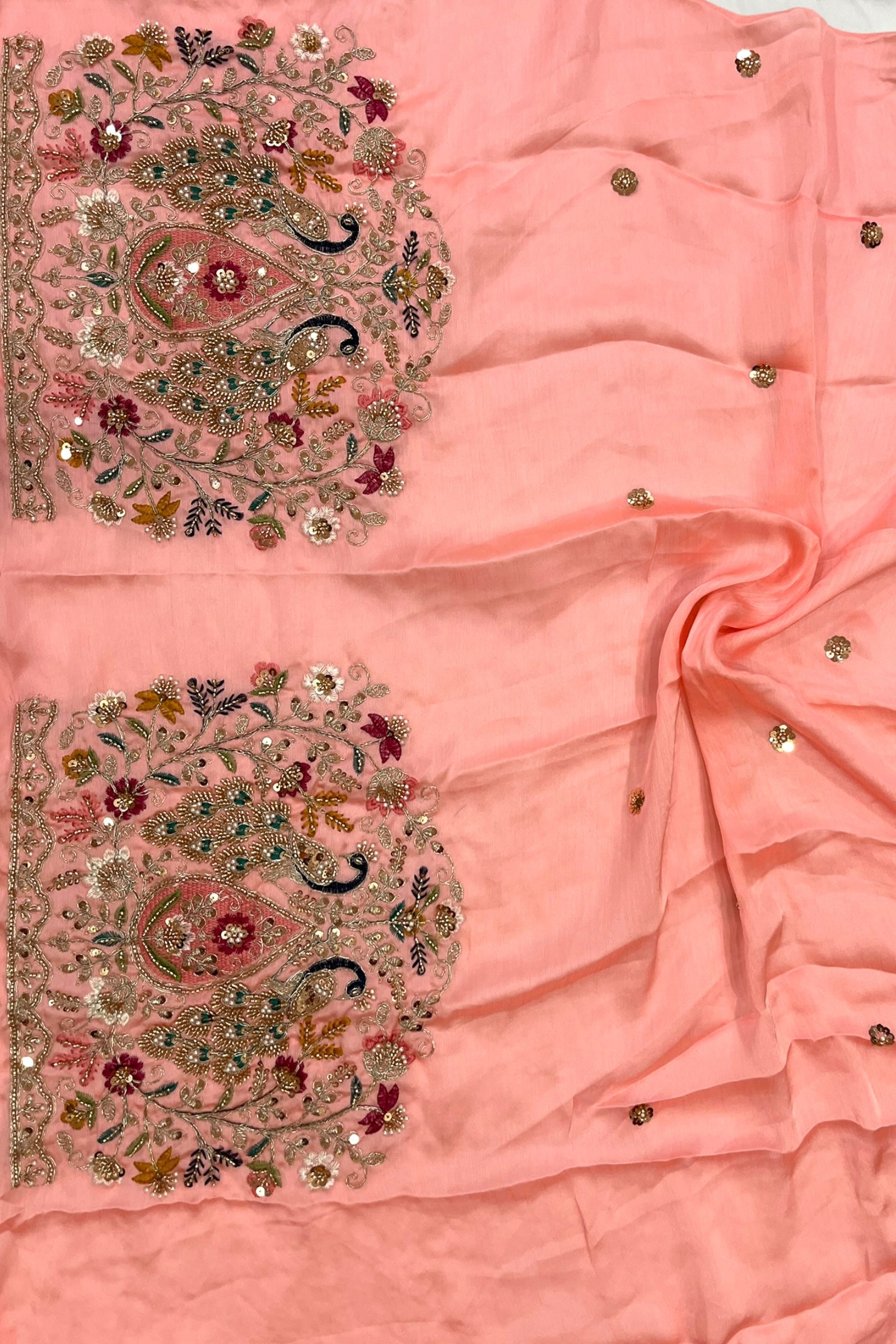 Coral Peach Printed Floral Organza Saree with Embroidered Peacock Blouse