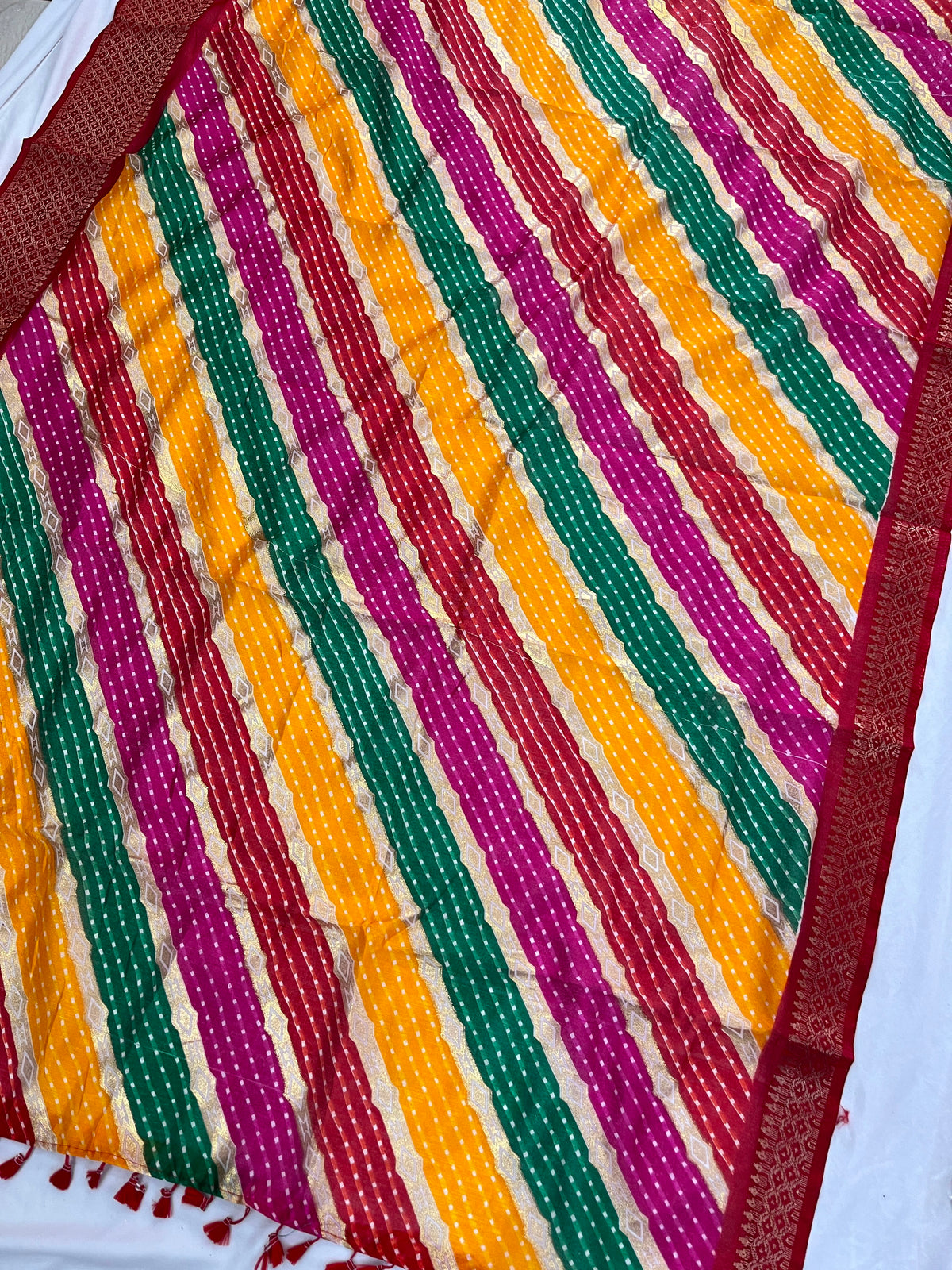 Multicolor Leheriya Saree with Woven Zari Border & Tassels