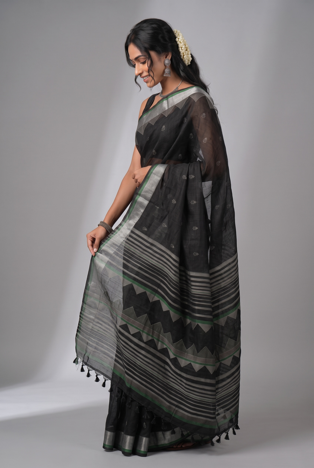 Midnight Elegance: Black Handloom Saree with Silver Zari & Geometric Pallu