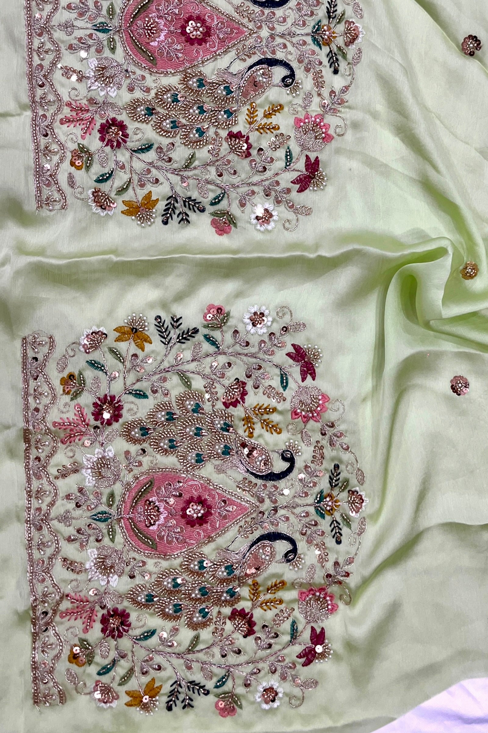 Sage Green Printed Floral Organza Saree with Embroidered Peacock Blouse