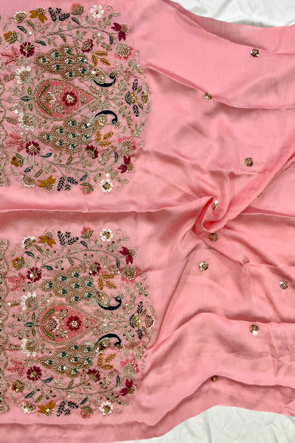 Soft Pink Floral print Organza Saree with Embroidered Peacock Blouse